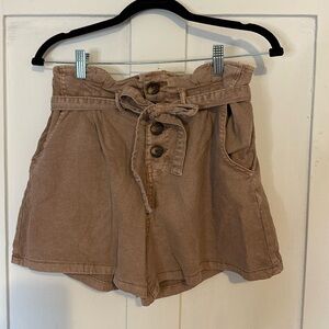 Rose colored paper bag denim shorts
